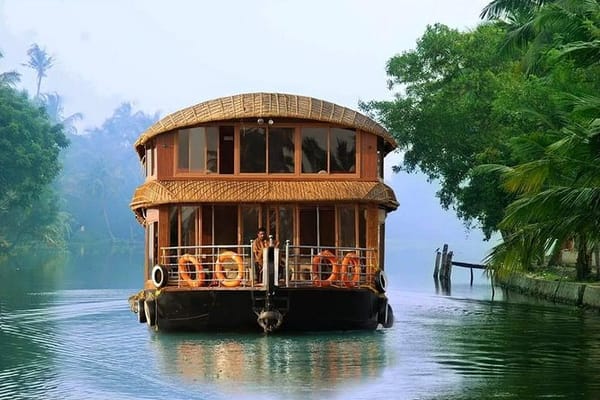 Panoramic view of the lush backwaters in Kerala, inviting travelers to explore the scenic beauty and tranquility.